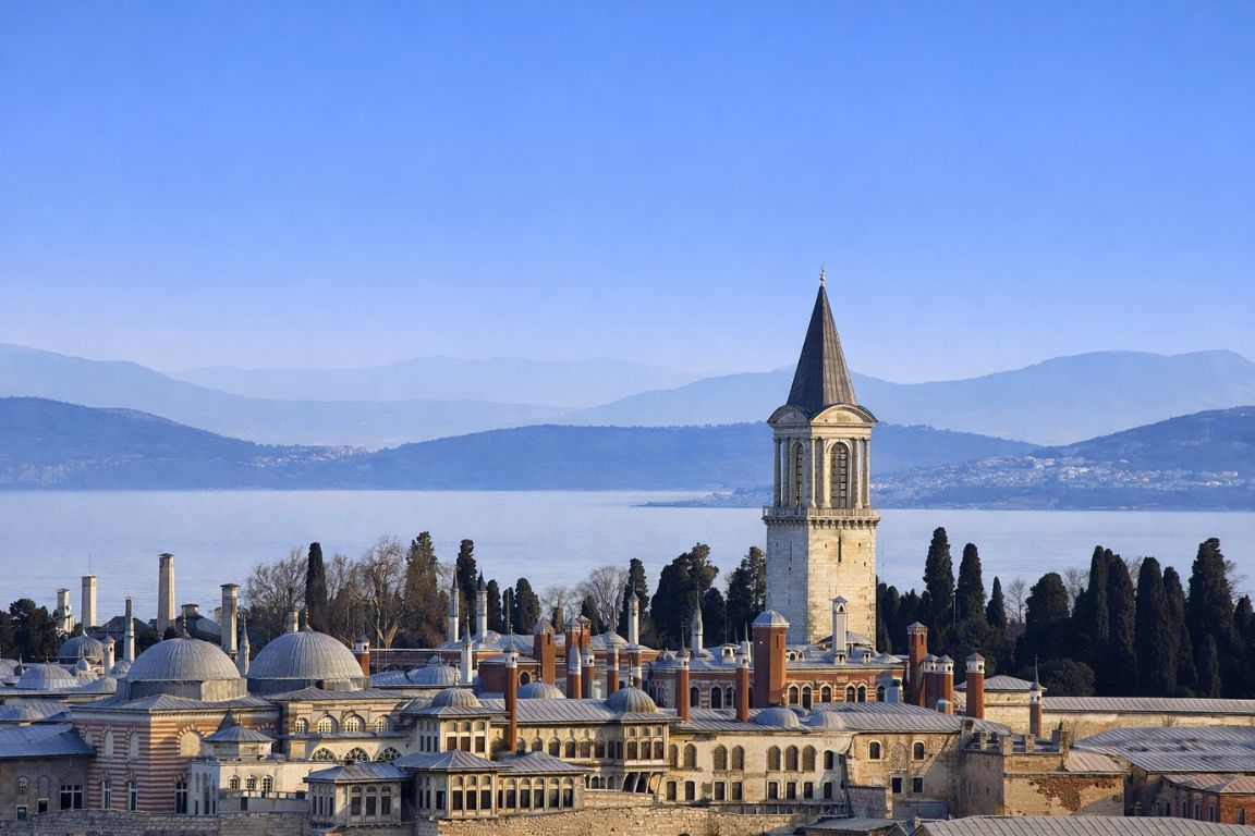 Panoramic view of Topkapi Palace complex in Istanbul with domes and tower near the Bosphorus, photographed during a Hagia Sophia Tours experience